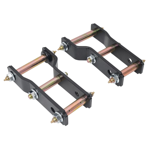 Two sets of black metal shackle lift kits are shown, featuring gold-colored metal bolts and bushings. Each set consists of two flat black metal plates connected by two of the bolts/bushings, creating a rectangular shape. The bolts extend past the plates and are secured with nuts at the ends, often used to raise a vehicle's suspension. The image is on a dark, checkered background.