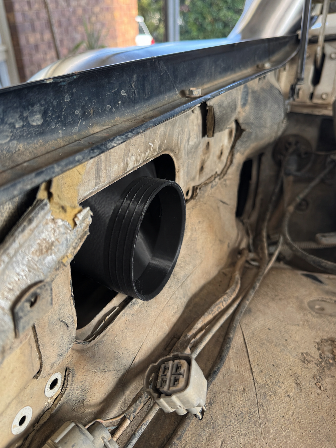 Canna Fabrication 80 Series snorkel 4" aftermarket airbox outlet adapter fitted through the inner guard