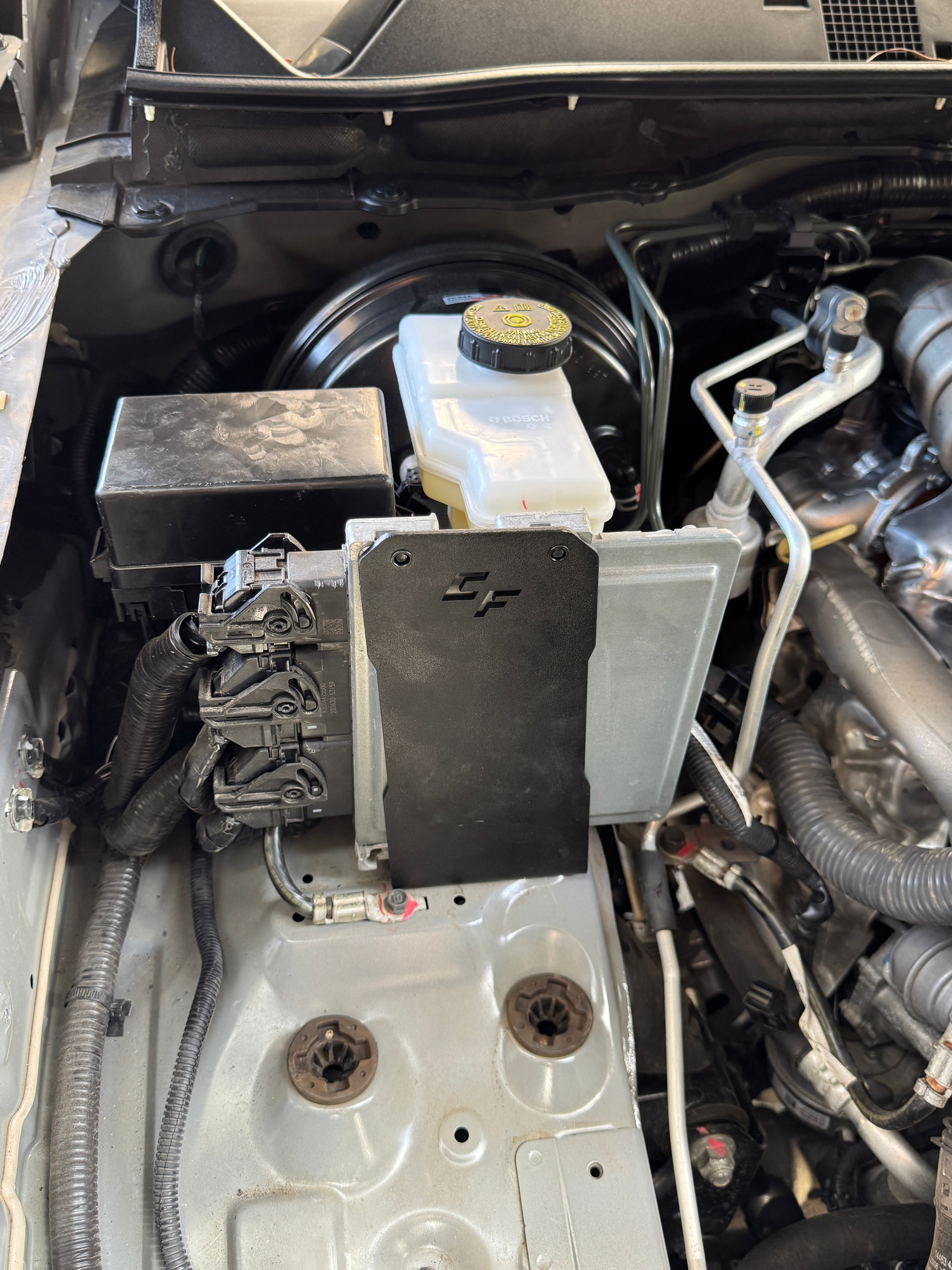 Nissan Navara NP300 ECU relocation bracket by Canna Fabrication