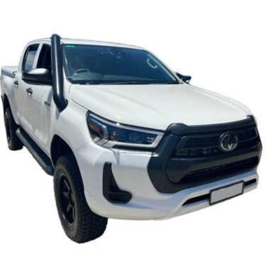 A white, modern Toyota Hilux pickup truck (double cab) with a black front grille, black wheels, and a black snorkel mounted externally on the driver's side A-pillar and fender. The vehicle appears to be isolated on a white background.
