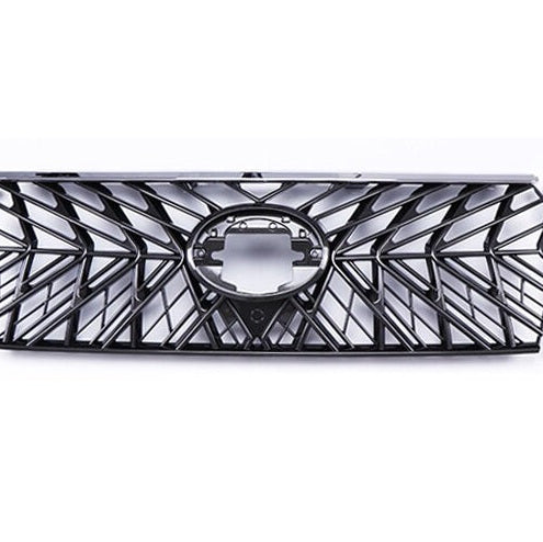 A cropped, straight-on view of a black vehicle grille, isolated on a white background. The grille features a distinctive, complex spiderweb or geometric spoke pattern radiating from a central oval opening designed to hold a badge.