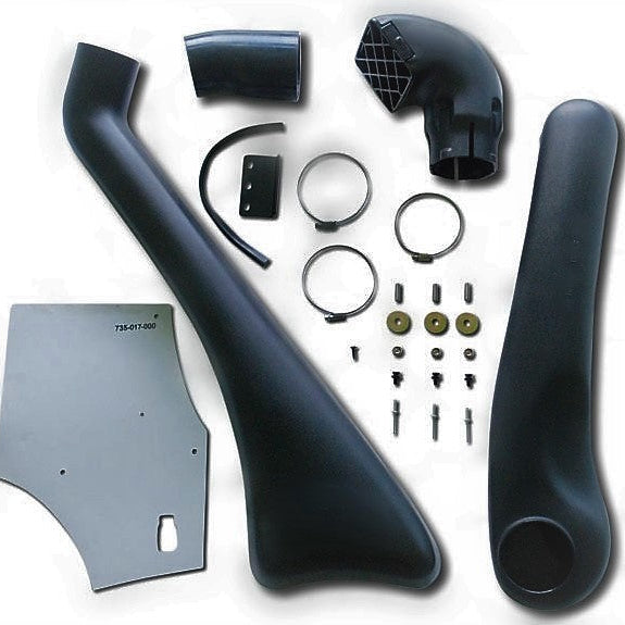 A flat lay image displaying the complete contents of an automotive snorkel kit for off-road vehicles. The parts, mostly black plastic and metal, are scattered against a white background. Key components include: the main curved black snorkel body, a template (flat grey piece with part number "735-017-000"), the upper snorkel head/air ram (a black elbow piece with a grate), various connection hoses/ducts, metal hose clamps, and a collection of small screws, bolts, washers, and metal brackets for mounting. The