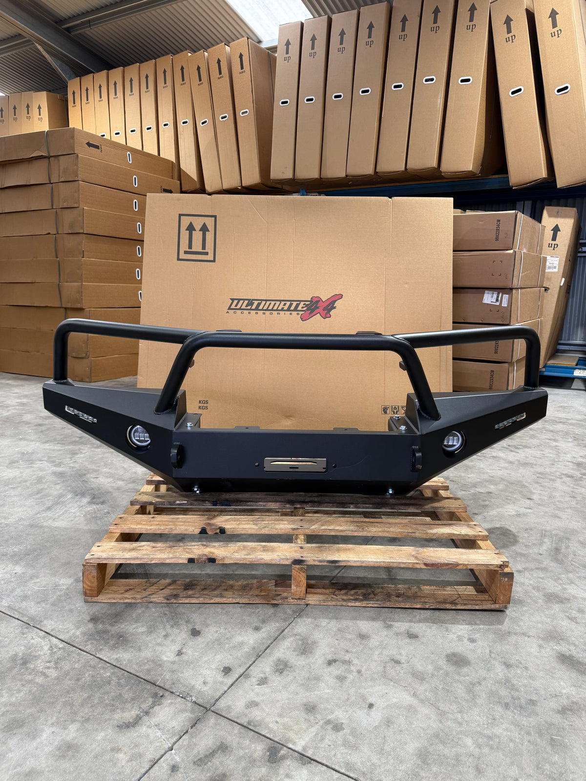 Front view of the Krawler High Mount triple-hoop bull bar in textured black for Toyota LandCruiser 80 Series 1990–1998
