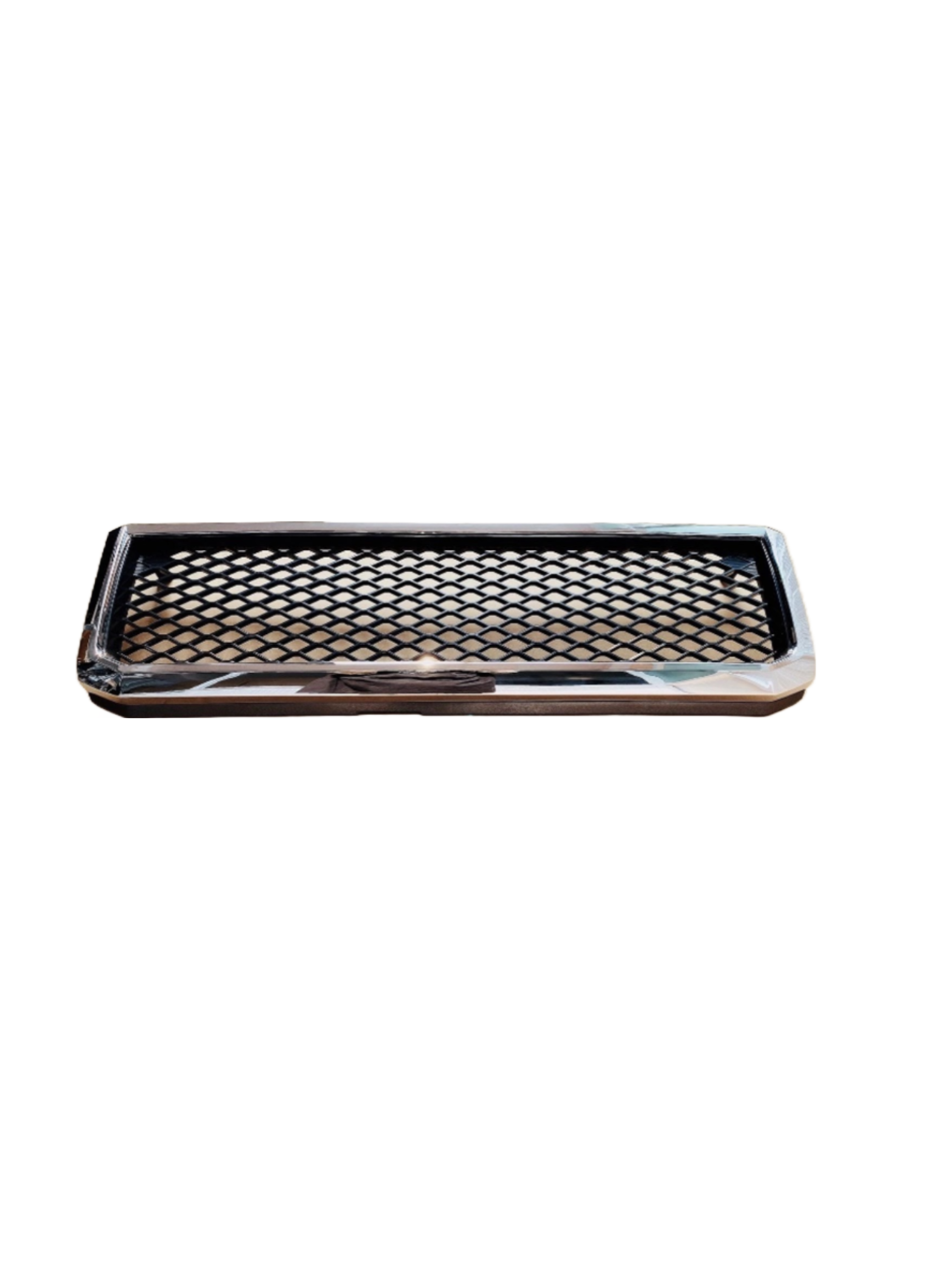 A rectangular chrome trim piece or bezel surrounding a black diamond mesh grille insert. This component is likely a decorative cover or air vent insert, possibly for a vehicle hood scoop, fender vent, or part of a main grille. It is photographed straight-on against a white background.