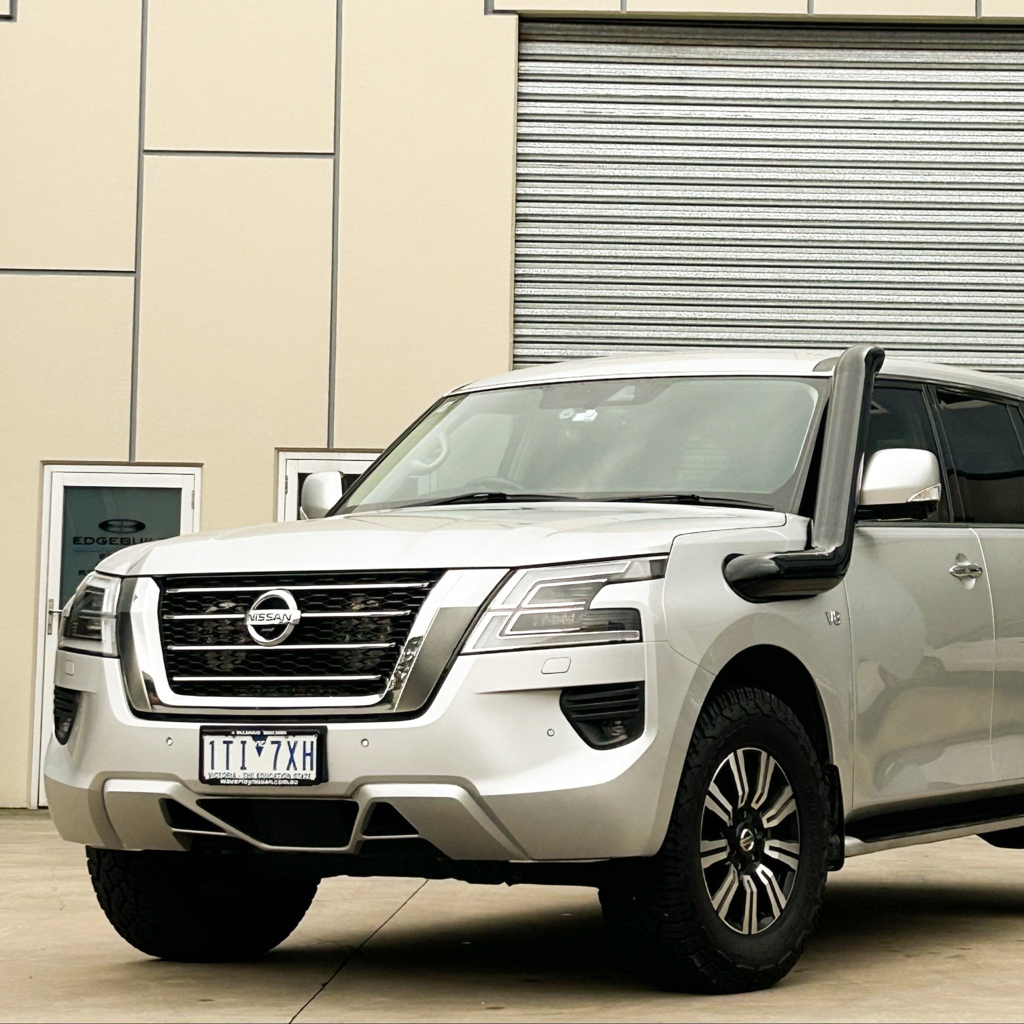 Nissan Patrol Y62 mid-entry stainless steel snorkel by Canna Fabrication