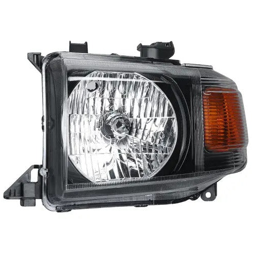A product photo showing a single vehicle headlight assembly, isolated on a white background. The unit features a black housing, a large circular reflector for the main beam, and a ribbed amber reflector/turn signal on the outer side. The clear lens covers the entire assembly.